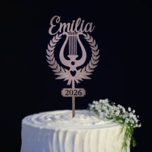 Kakkukoriste ylioppilasjuhliin. Lyyra nimellä ja vuosiluvulla.